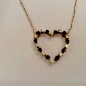 Heart of precious diamonds & sapphires.  Tiffany & Company purchased appraised